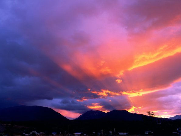 Breaking Through the Clouds at Sunset