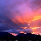 Breaking Through the Clouds at Sunset